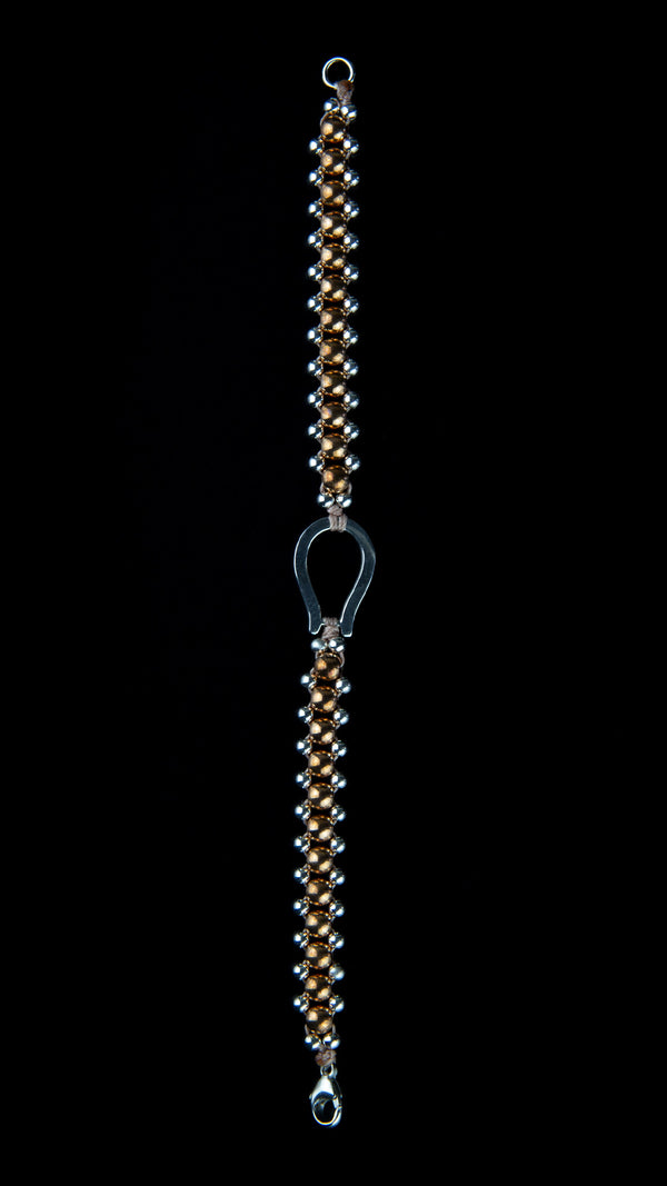 Bracciale con sfere in bronzo e argento