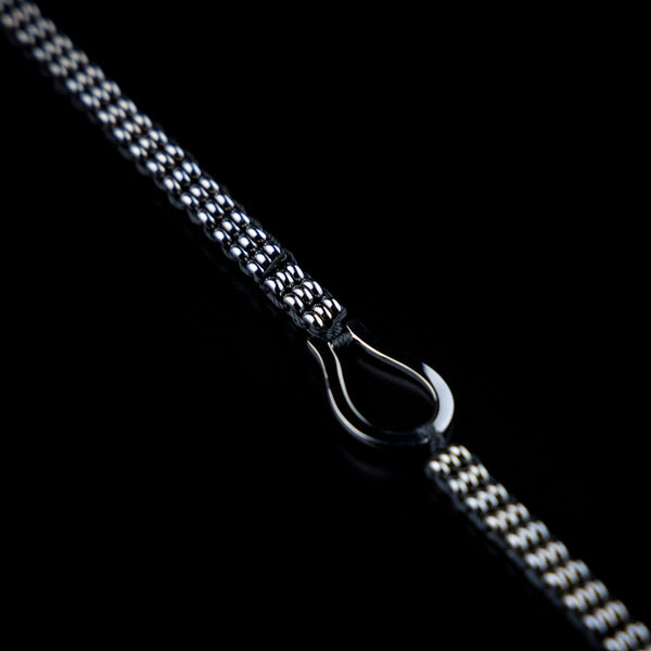 Bracciale con rondelle a tre file